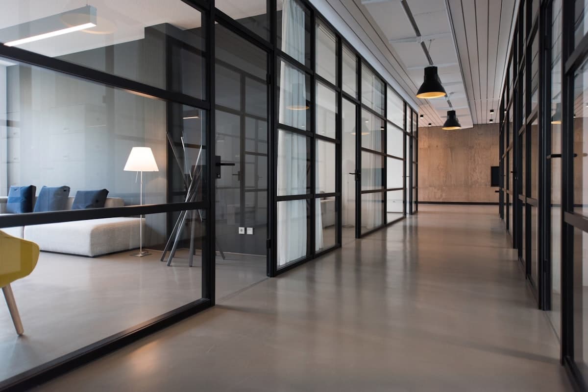 A modern open-plan office where a B2B revenue team works